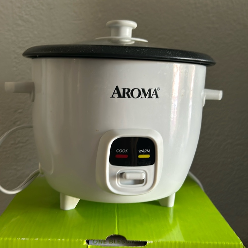 It is a rice cooker that is brand new and has never been touched